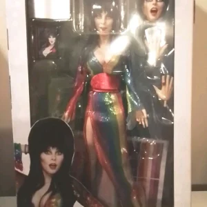 Elvira - Over the Rainbow Clothed 7" Scale Action Figure by NECA