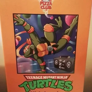 Teenage Mutant Ninja Turtles - Michelangelo VHS Cartoon Ultimate 7" Scale Action Figure by NECA