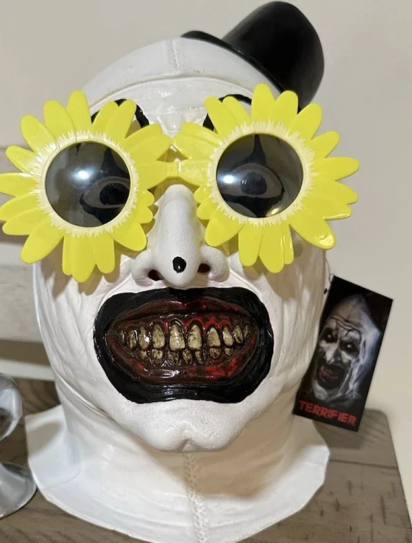 Terrifier Art the Clown Bloody Half Mask with Sunflower Sunglasses by Spirit Halloween at themoviemerch.com