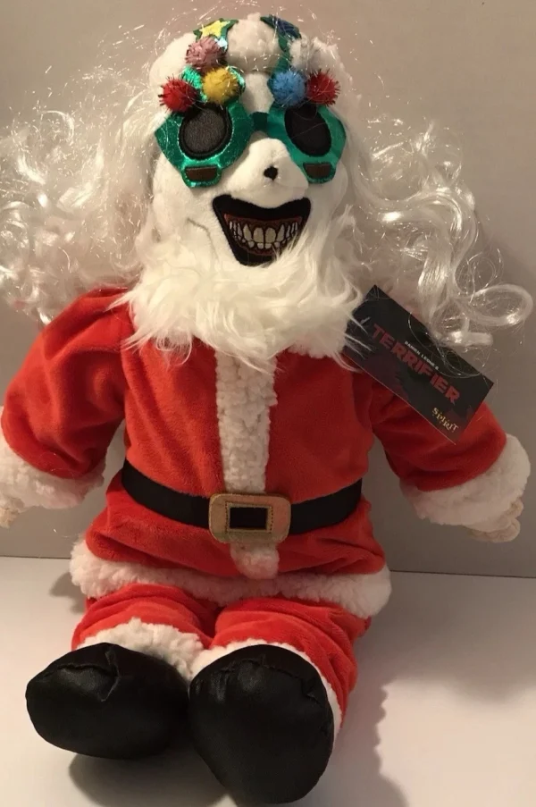 Terrifier Art the Clown Santa Plush Toy by Spirit Halloween | Horror Collectible at themoviemerch.com